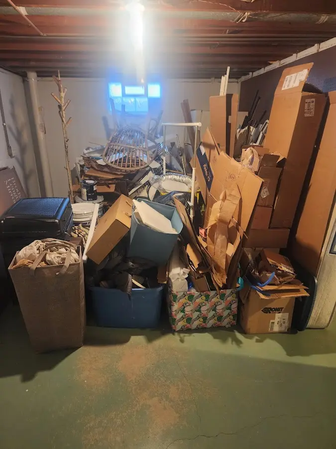 Roll-off dumpster container at job site for 15 Yard Dumpster Rental in Adel